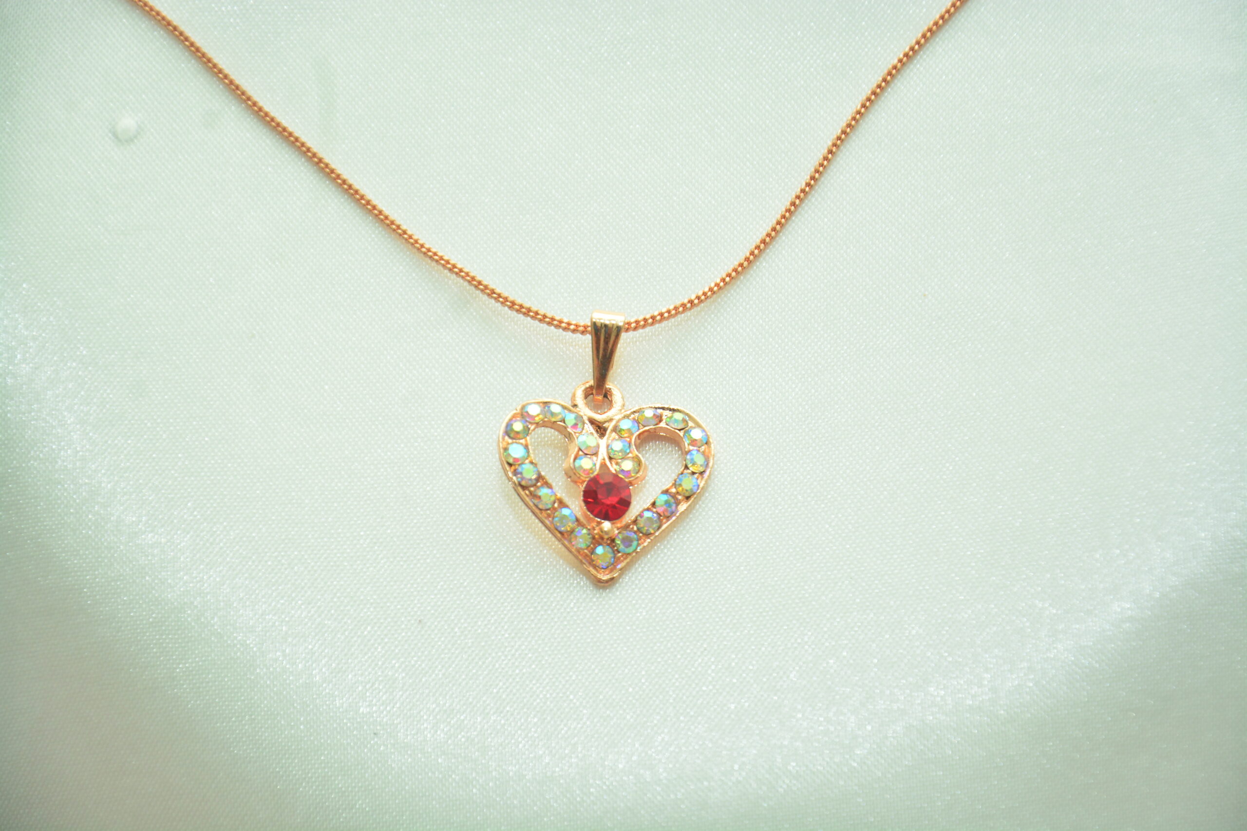 Rose Gold Heart Pendant with Red Stone