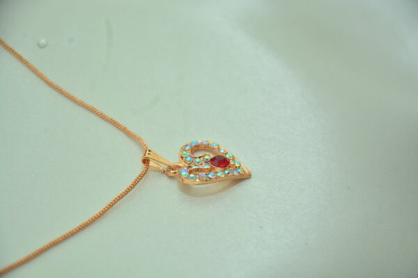 Rose Gold Heart Pendant with Red Stone - Image 2